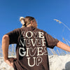 NEW! | "LOVE NEVER GIVES UP" TEE | CHOCOLATE