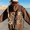 NEW! | "LOVE NEVER GIVES UP" HOODIE | CHOCOLATE
