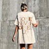 LIMITED RESTOCK! | "LOVE NEVER GIVES UP" BUBBLE TEE | SAND